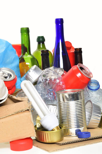istock trash for recycling with paper glass bottles, cans, plastic bottle, light bulb 1001600902