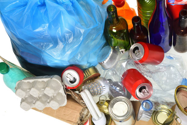 istock trash for recycling with paper glass bottles, cans, plastic bottle, light bulb 1001600948