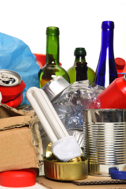 istock trash for recycling with paper glass bottles, cans, plastic bottle, light bulb 1001603412