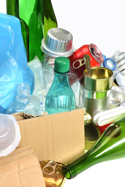 istock trash for recycling with paper glass bottles, cans, plastic bottle, light bulb 1001603420