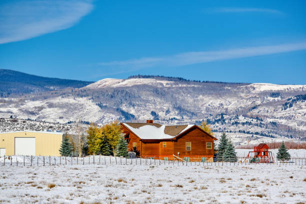 istock Season changing, first snow on roof. 1001603628