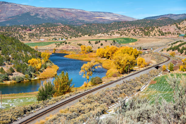 istock Landscape with autumn trees and river 1001603788