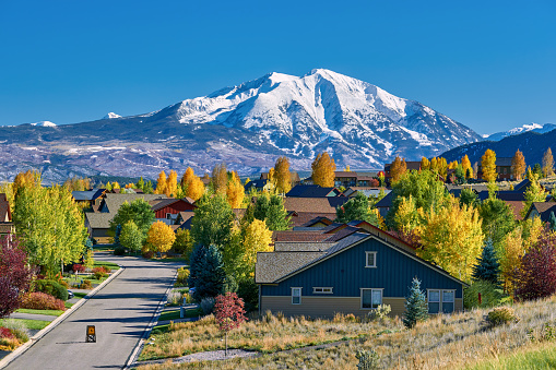 Residential neighborhood in Colorado at autumn, USA. Mount Sopris landscape.