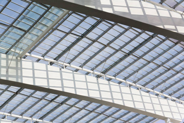 istock glass roof with steel structure background, transparent roof. 1001607082