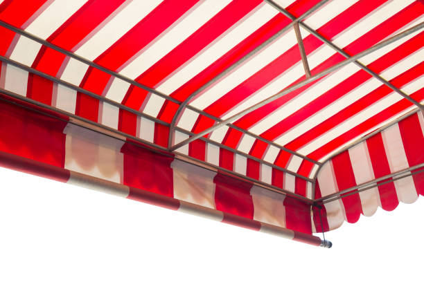 istock red and white striped awning isolate on white background, shading canvas with steel structure background 1001607474