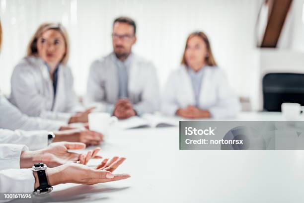 Medical Staff Discussing At The Table Copy Space Stock Photo - Download Image Now - Doctor, Meeting, Healthcare And Medicine