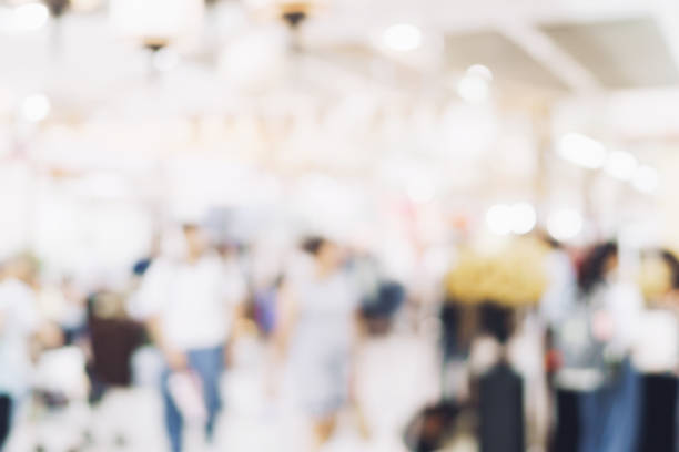 istock Blur image background of people in exhibition show. 1001618294
