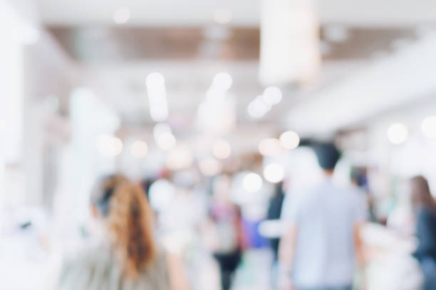 istock Blur image background of people in exhibition show. 1001618402