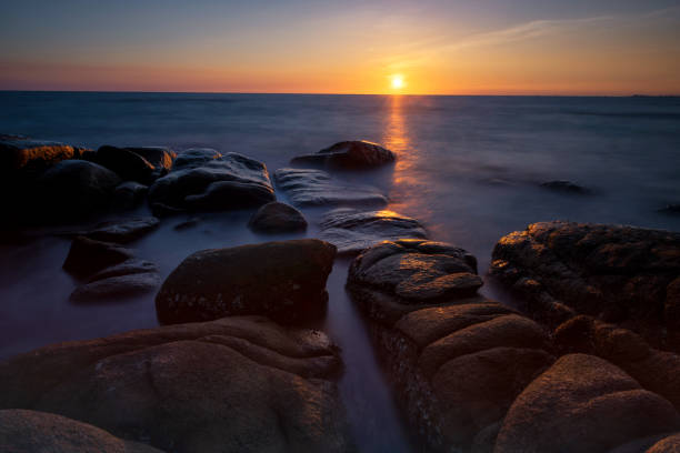 istock Seascape at sunset in tropical beach 1001619026