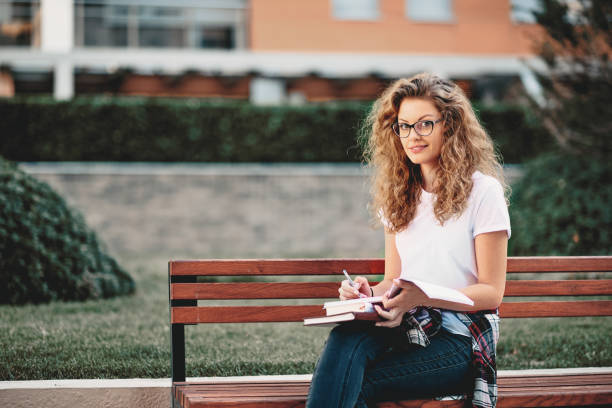 istock Female student sitting in a campus. 1001619102