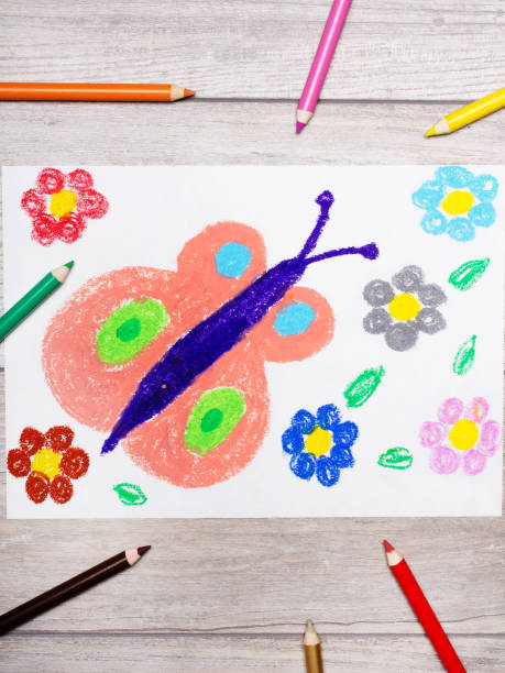 istock Colorful hand drawing: Springtime, butterfly and cute flowers. 1001625956