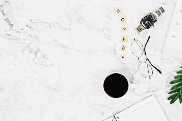 istock Top view of black coffee cup with eyeglasses 1001628686