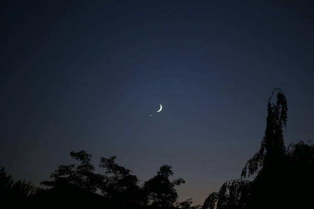 Venus and the Moon over British Columbia Canada in summer.