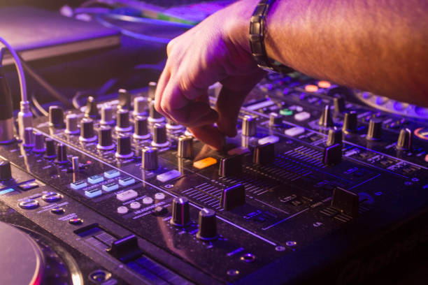 istock Dj hand playing music on the desk 1001657448