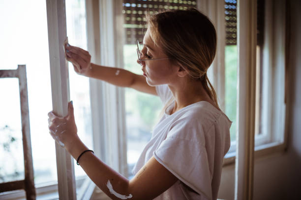 istock Woman doing some home improvements 1001661398