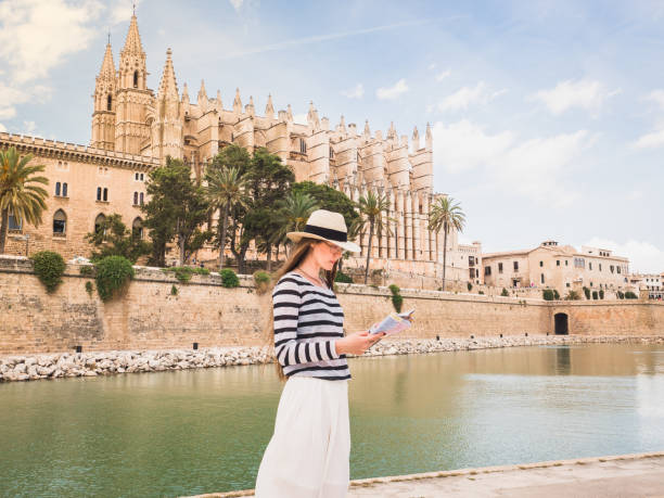 istock Stylish woman looking at the map 1001661776