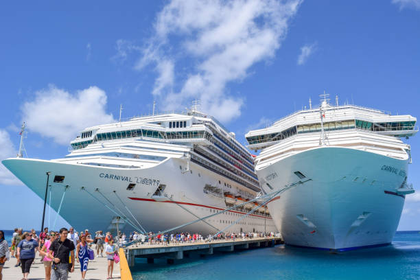 Tallinn, Estonia - July 24, 2023: Cruise ships Europa (Hapag-Lloyd Cruises) and Avitak (Aida Cruises) docked in port of Tallinn Estonia on a summer day.