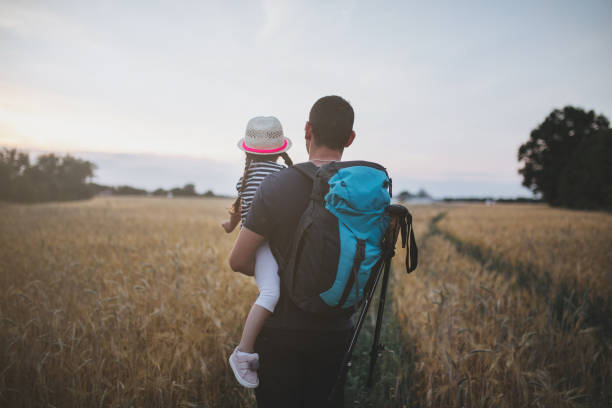 istock Hiking family exploring meadow 1001669434
