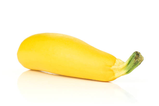 istock Fresh Raw yellow zucchini isolated on white 1001681388