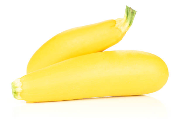 istock Fresh Raw yellow zucchini isolated on white 1001683578