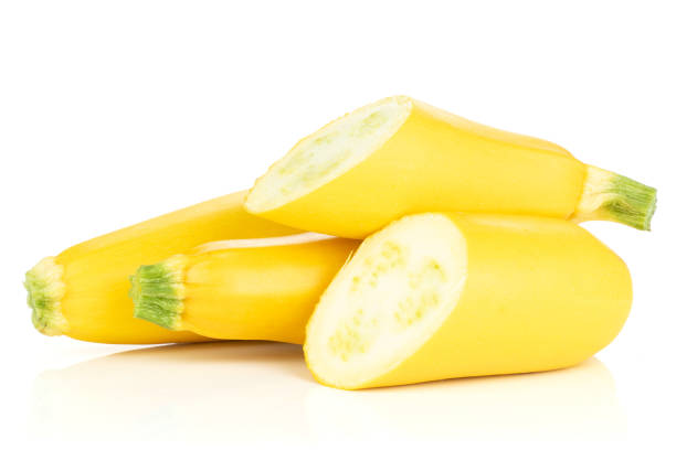 istock Fresh Raw yellow zucchini isolated on white 1001683704