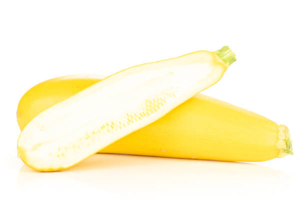 istock Fresh Raw yellow zucchini isolated on white 1001684080