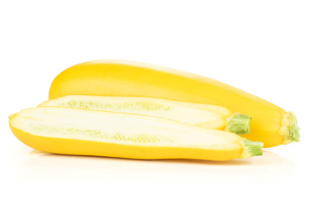 istock Fresh Raw yellow zucchini isolated on white 1001684202