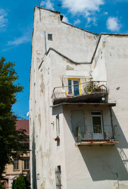 istock An old buliding with windows and balconies. 1001685022