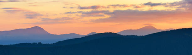 istock Sunset panorama of mountains 1001688054