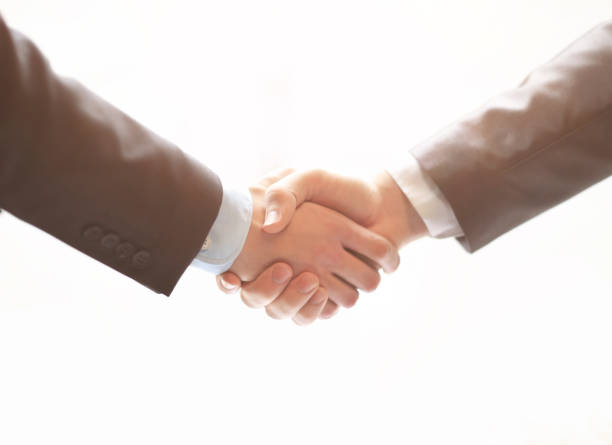 istock Closeup of business hand shake between two colleagues 1001709404