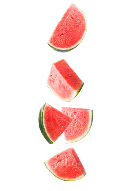 istock Red falling watermelon isolated on white background with clipping path as package design element and advertising. Floating fruits in the air 1001711902