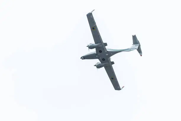 Photo of Four seat double engine civil utility aircraft before landing