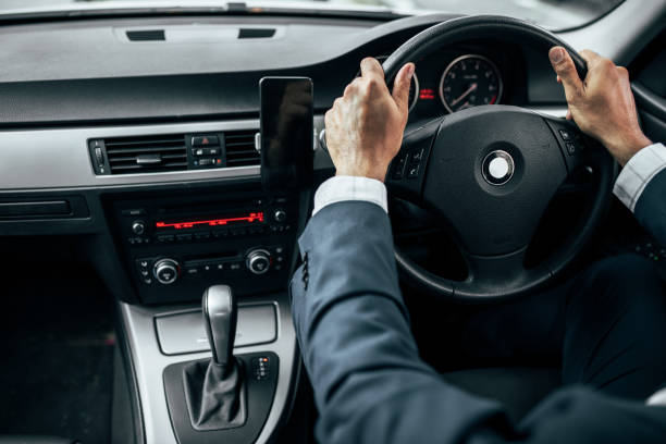 istock Businessman driving car 1001718304