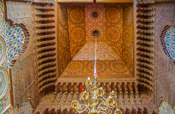 istock Moroccan lantern and cedar wood carved ceiling in Fes 1001721794