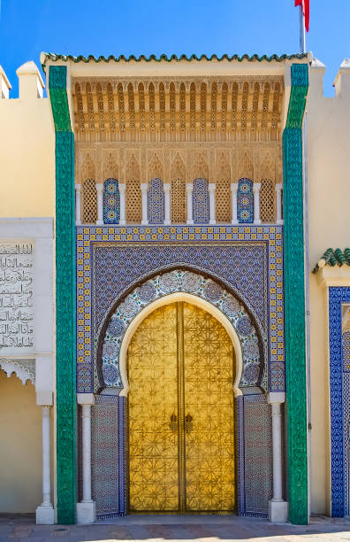 Gate to the palace of the king of Morocco in Fes Fez, Morocco - May 11, 2013: One of of the main gates to the palace of the king of Morocco marrakesh riad stock pictures, royalty-free photos & images
