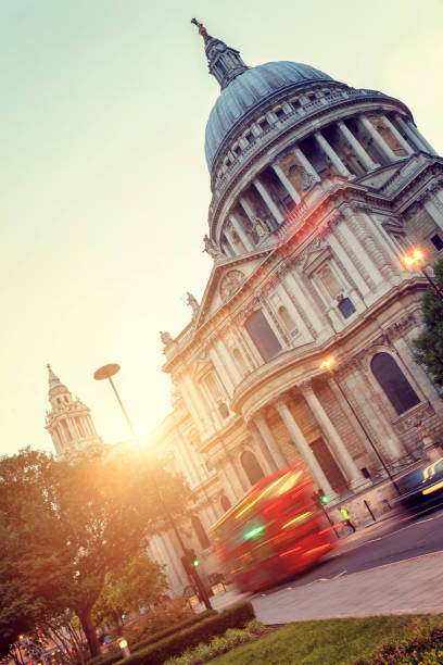 istock Traffic with St Paul's Cathedral dome at sunset in London 1001726810