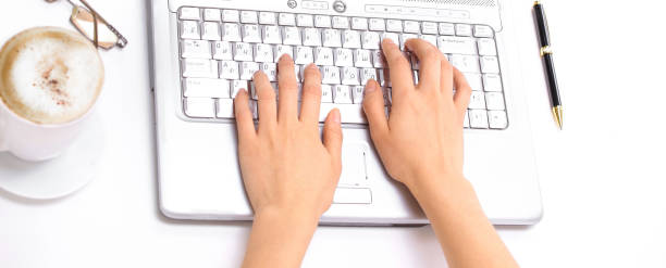 istock closeup.young woman typing text on laptop keyboard 1001731236