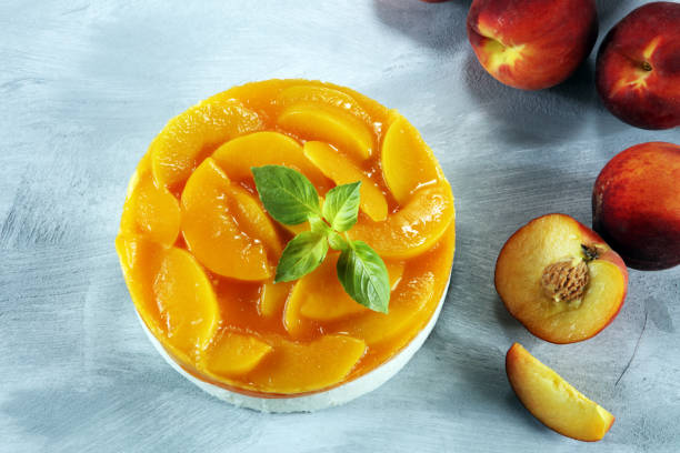 istock cheesecake with peache. Homemade cream cake with peaches 1001734972