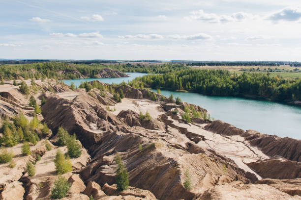 istock Abandoned sand quarry to the blue lake 1001735156