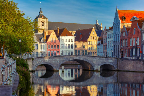 istock Night Bruges canal and bridge, Belgium 1001735640