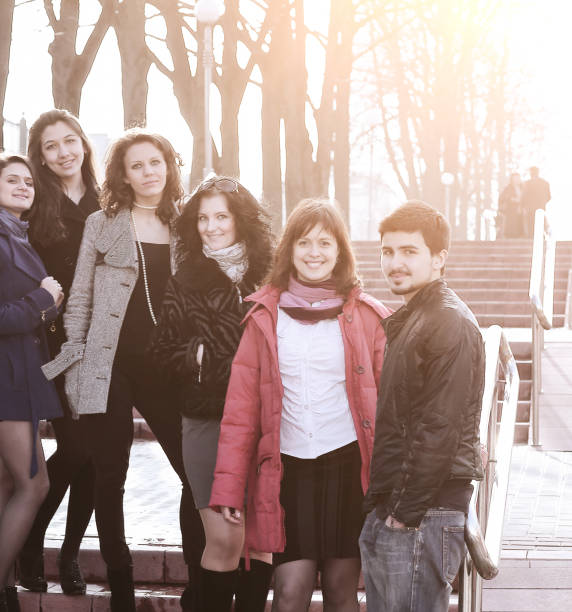 istock group of students standing on the street 1001737950