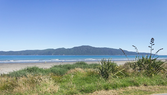 Landscape view of Kapiti Island from Paraparaumu Beach on Wellington's Kapiti Coast of New Zealand.