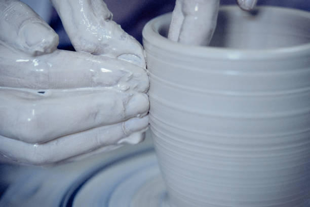 istock Creating ceramic products of white clay close-up 1001751068