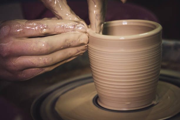 istock Creating ceramic products of white clay close-up 1001751246