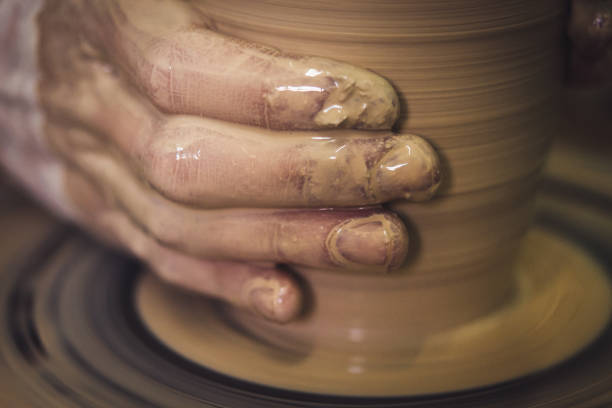 istock Creating ceramic products of white clay close-up 1001753442