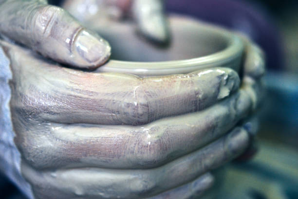 istock Creating ceramic products of white clay close-up 1001753466