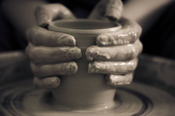 creating ceramic products of white clay close-up - craft traditional culture horizontal photography imagens e fotografias de stock