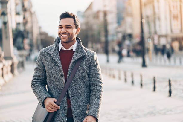 istock Good looking man on the street at sunlight 1001754006