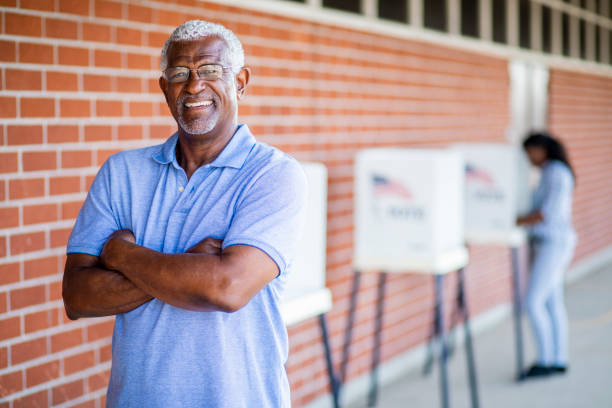 istock Senior Black Man Voting Portrait 1001754638