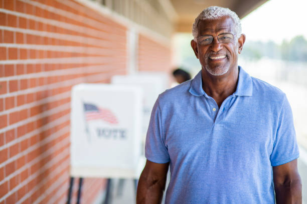 istock Senior Black Man Voting Portrait 1001754836